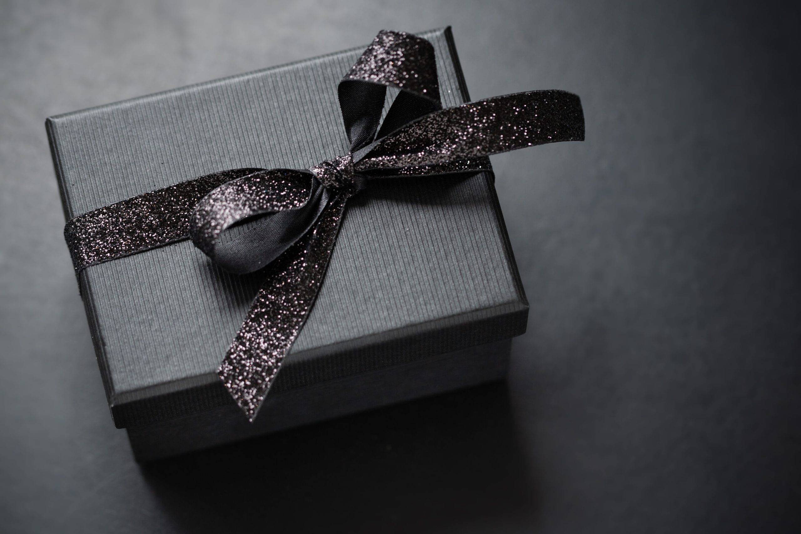 Dark giftbox on dark background